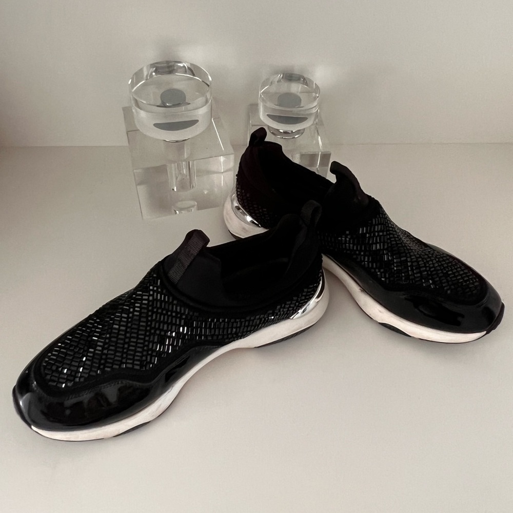 Previously worn woman’s designer shoes.